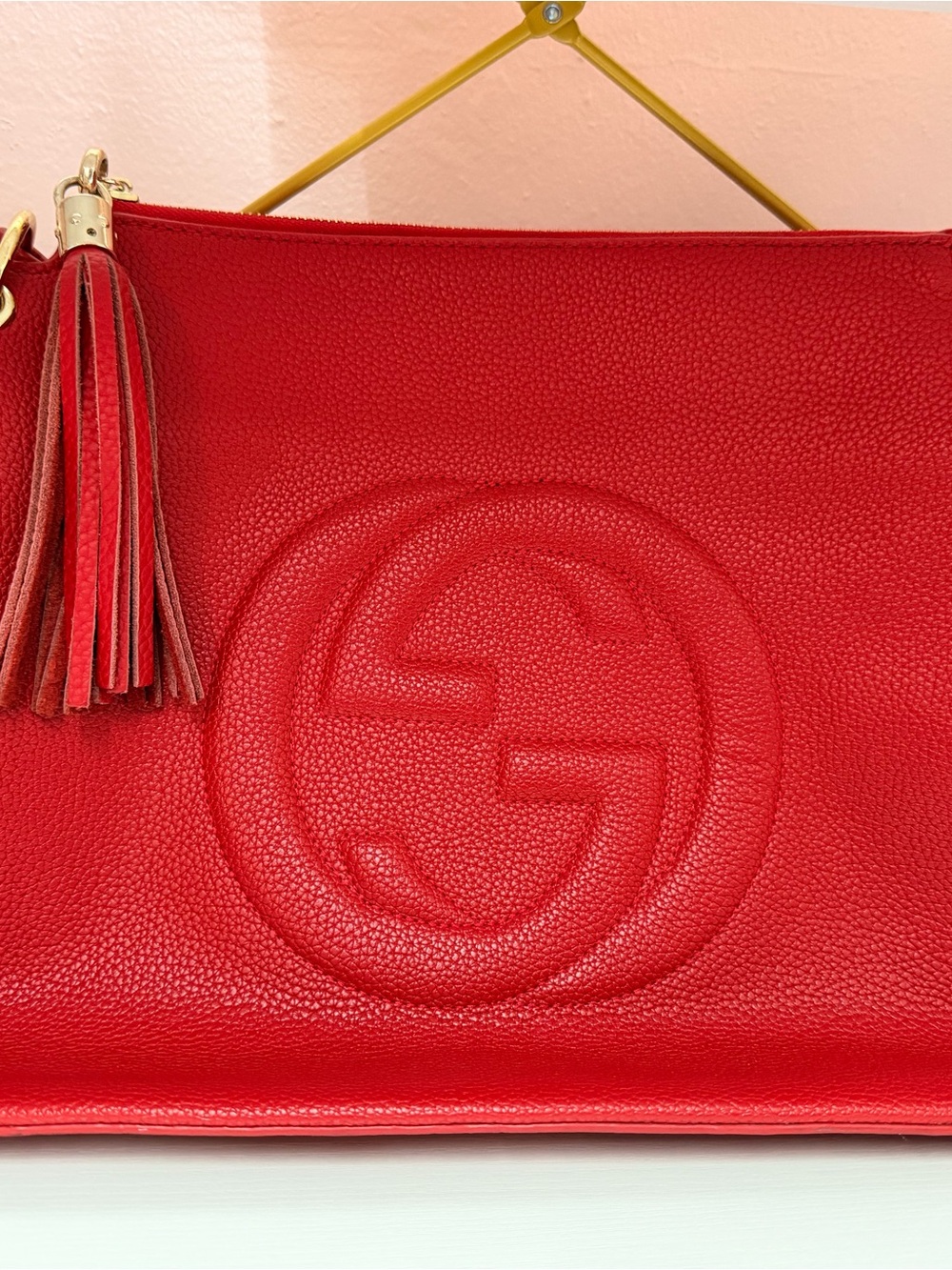 Gucci Red Pebbled Leather Wristlet Clutch with Tassel Detail